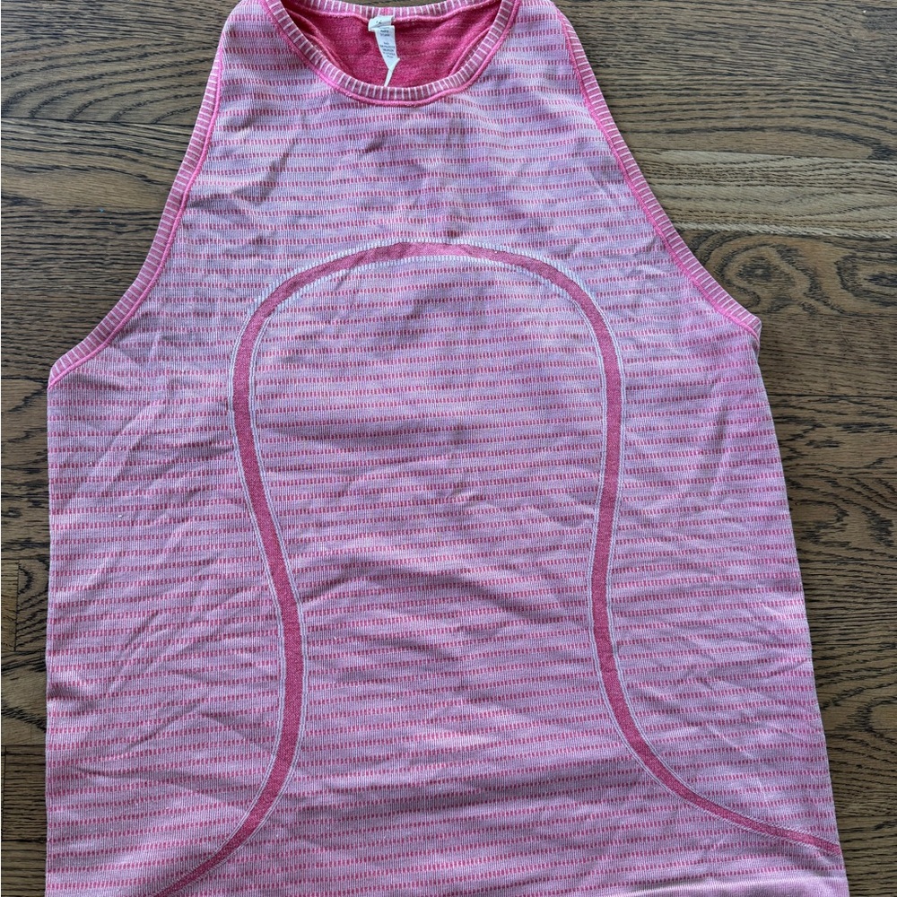 Lululemon Pink Tank top 12
Some snags so greatly reduced price